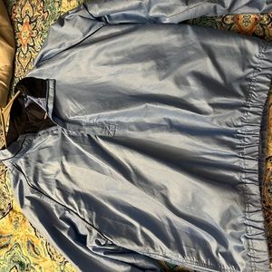 Light blue wind breaker medium